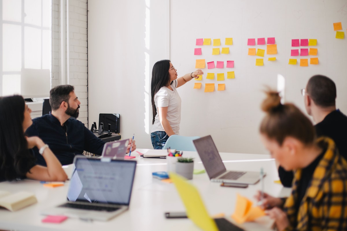 Event promoter team planning communication strategy and ticket sales launch